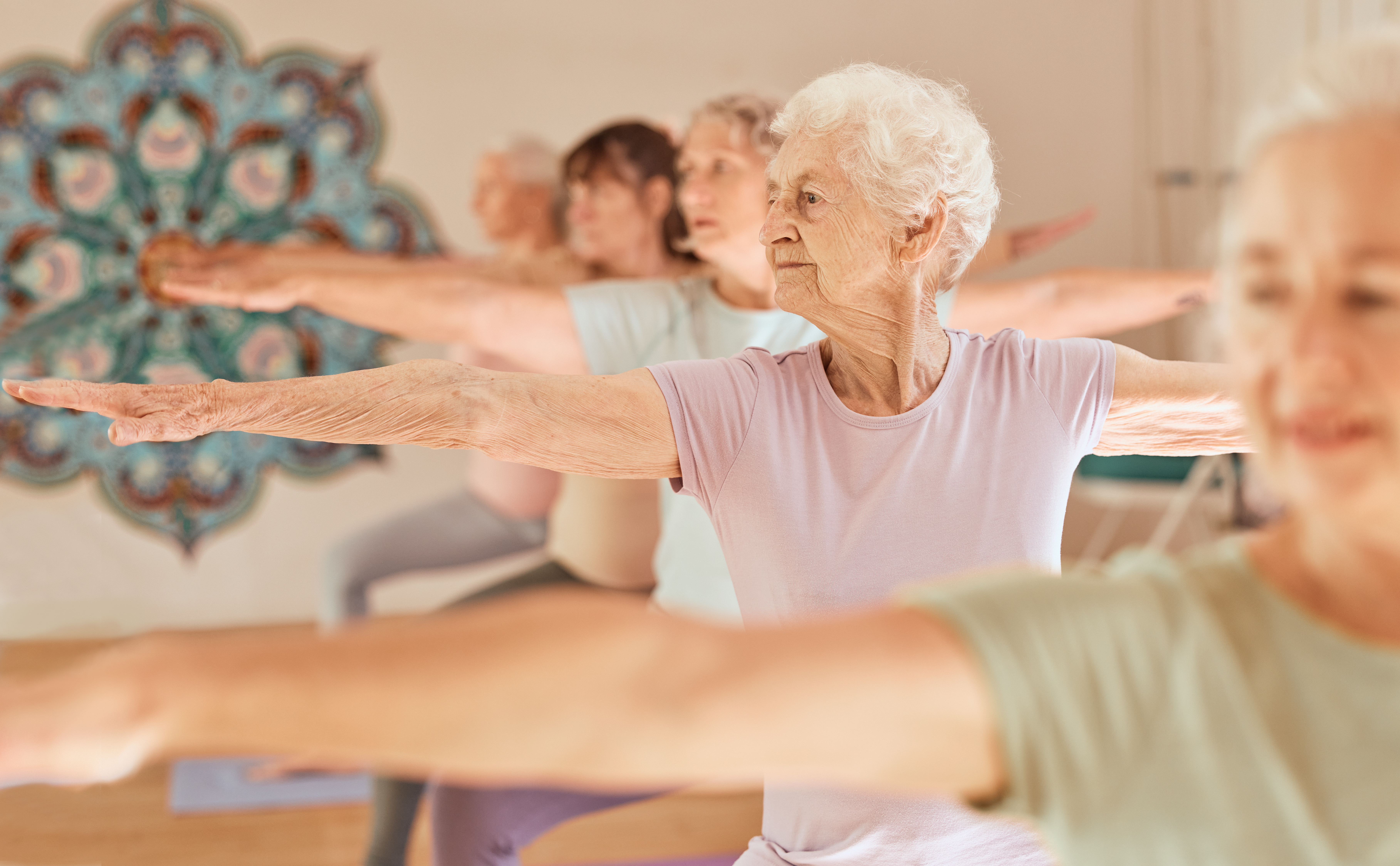 Yoga fitness, class and senior women training for elderly wellness, health and retirement self care in pilates studio. 